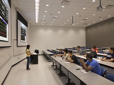 Large classroom/lecture hall with models